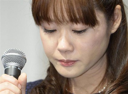 Haruko Obokata, a researcher at semi-governmental research institute RIKEN, lowers her eyes during a news conference in Osaka, western Japan Haruko Obokata, a researcher at semi-governmental research institute RIKEN, lowers her eyes during a news conference in Osaka, western Japan