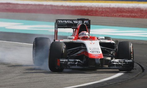 Marussia Formula One driver Jules Bianchi of France brakes as he takes a corner during the Malaysian F1 Grand Prix at Sepang International C Marussia Formula One driver Jules Bianchi of France brakes as he takes a corner during the Malaysian F1 Grand Prix at Sepang International C