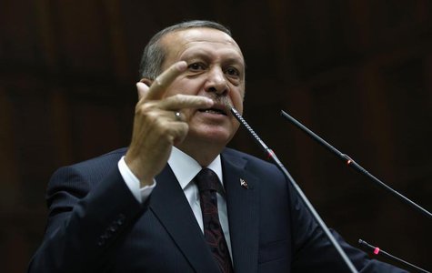 Turkey's Prime Minister Tayyip Erdogan addresses members of parliament from his ruling AK Party (AKP) during a meeting at the Turkish parlia Turkey's Prime Minister Tayyip Erdogan addresses members of parliament from his ruling AK Party (AKP) during a meeting at the Turkish parlia