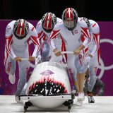Poland's pilot Dawid Kupczyk (front R), Daniel Zalewski, Michal Kasperowicz and Pawel Mroz start a heat during the four-man bobsleigh event Poland's pilot Dawid Kupczyk (front R), Daniel Zalewski, Michal Kasperowicz and Pawel Mroz start a heat during the four-man bobsleigh event