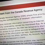 The Canada Revenue Agency website is seen on a computer screen displaying information about an internet security vulnerability called the "H The Canada Revenue Agency website is seen on a computer screen displaying information about an internet security vulnerability called the "H