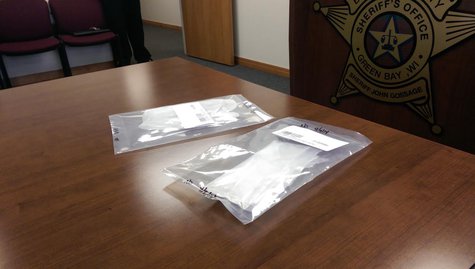 Heroin confiscated from Green Bay man arrested as a trafficking suspect on April 9, 2014. (Photo from: WTAQ Reporter Jeff Flynt.) Heroin confiscated from Green Bay man arrested as a trafficking suspect on April 9, 2014. (Photo from: WTAQ Reporter Jeff Flynt.)