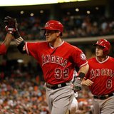 Apr 5, 2014; Houston, TX, USA; Los Angeles Angels left fielder Josh Hamilton (32) high-fives second baseman Howie Kendrick (47) after hittin Apr 5, 2014; Houston, TX, USA; Los Angeles Angels left fielder Josh Hamilton (32) high-fives second baseman Howie Kendrick (47) after hittin