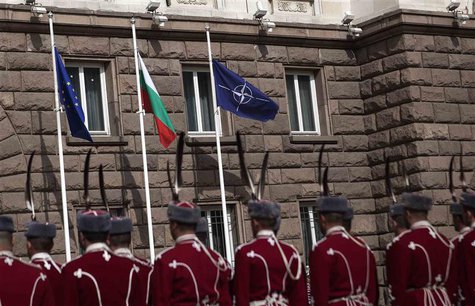 Bulgarian honour guard soldiers attend a flag-raising ceremony as part of celebrations of the 10th anniversary of Bulgaria joining NATO, in Bulgarian honour guard soldiers attend a flag-raising ceremony as part of celebrations of the 10th anniversary of Bulgaria joining NATO, in