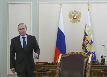 Russia's President Vladimir Putin arrives for a meeting with members of the government at the Novo-Ogaryovo state residence outside Moscow, Russia's President Vladimir Putin arrives for a meeting with members of the government at the Novo-Ogaryovo state residence outside Moscow,