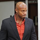 Jamaica's Olympic runner Asafa Powell, who tested positive for doping at the Jamaican Championships in 2013, takes a lunch break on the firs Jamaica's Olympic runner Asafa Powell, who tested positive for doping at the Jamaican Championships in 2013, takes a lunch break on the firs