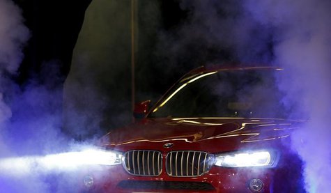 The new BMW X4 is unveiled during an event at the BMW manufacturing plant in Spartanburg, South Carolina March 28, 2014. REUTERS/Chris Keane The new BMW X4 is unveiled during an event at the BMW manufacturing plant in Spartanburg, South Carolina March 28, 2014. REUTERS/Chris Keane