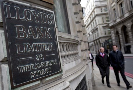 File photograph shows pedestrians walking past a branch of Lloyds Bank in the City London February 3, 2014. REUTERS/Neil Hall/Files File photograph shows pedestrians walking past a branch of Lloyds Bank in the City London February 3, 2014. REUTERS/Neil Hall/Files