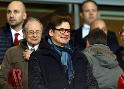 British actor Colin Firth attends the Champions League round of 16 first leg soccer match between Arsenal and Bayern Munich at the Emirates British actor Colin Firth attends the Champions League round of 16 first leg soccer match between Arsenal and Bayern Munich at the Emirates