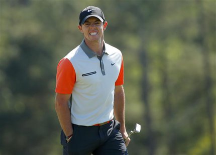 Northern Ireland's Rory McIlroy reacts after missing a putt on the 18th hole during the first round of the 2014 Masters golf tournament at t Northern Ireland's Rory McIlroy reacts after missing a putt on the 18th hole during the first round of the 2014 Masters golf tournament at t