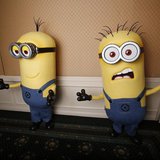 Two life-size minion characters wait for actor Steve Carell to arrive while promoting his upcoming movie "Despicable Me 2" in Los Angeles, C Two life-size minion characters wait for actor Steve Carell to arrive while promoting his upcoming movie "Despicable Me 2" in Los Angeles, C