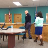 Wisconsin State Patrol Trooper Justin Hansen (center) walking with a cane prior to a press conference updating his recovery from a serious accident at the Buchanan Town Hall on April 10, 2014. (Photo from: WTAQ Reporter Jeff Flynt). Wisconsin State Patrol Trooper Justin Hansen (center) walking with a cane prior to a press conference updating his recovery from a serious accident at the Buchanan Town Hall on April 10, 2014. (Photo from: WTAQ Reporter Jeff Flynt).