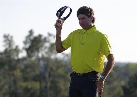 U.S. golfer Bubba Watson tips his hat after finishing the first round of the 2014 Masters golf tournament at the Augusta National Golf Club U.S. golfer Bubba Watson tips his hat after finishing the first round of the 2014 Masters golf tournament at the Augusta National Golf Club