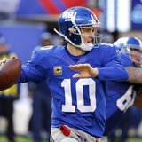 Dec 15, 2013; East Rutherford, NJ, USA; New York Giants quarterback Eli Manning (10) throws a pass during the first half against the Seattle Dec 15, 2013; East Rutherford, NJ, USA; New York Giants quarterback Eli Manning (10) throws a pass during the first half against the Seattle