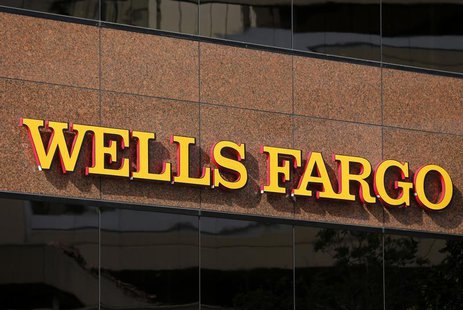 The logo on a Wells Fargo bank building is seen in downtown San Diego, California March 18, 2014. REUTERS/Mike Blake The logo on a Wells Fargo bank building is seen in downtown San Diego, California March 18, 2014. REUTERS/Mike Blake