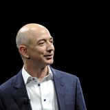 Amazon CEO Jeff Bezos demonstrates the Kindle Paperwhite during Amazon's Kindle Fire event in Santa Monica, California September 6, 2012. RE Amazon CEO Jeff Bezos demonstrates the Kindle Paperwhite during Amazon's Kindle Fire event in Santa Monica, California September 6, 2012. RE