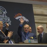 Seattle Seahawks owner and Microsoft co-founder Paul Allen (C) waves to the trading floor after ringing the opening bell at the New York Sto Seattle Seahawks owner and Microsoft co-founder Paul Allen (C) waves to the trading floor after ringing the opening bell at the New York Sto