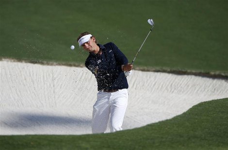 Joost Luiten of the Netherlands hits from a sandtrap on the 10th hole during a practice round ahead of the 2014 Masters golf tournament at t Joost Luiten of the Netherlands hits from a sandtrap on the 10th hole during a practice round ahead of the 2014 Masters golf tournament at t