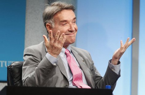 Brazilian Eike Batista, chairman and CEO of EBX Group, gestures as he is introduced as one of the world's wealthiest men, prior to the "Glob Brazilian Eike Batista, chairman and CEO of EBX Group, gestures as he is introduced as one of the world's wealthiest men, prior to the "Glob