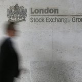A man walks past the London Stock Exchange in the City of London October 11, 2013. REUTERS/Stefan Wermuth A man walks past the London Stock Exchange in the City of London October 11, 2013. REUTERS/Stefan Wermuth