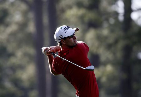 Australia's Adam Scott hits a shot on the 14th hole during the second round of the Masters golf tournament at the Augusta National Golf Club Australia's Adam Scott hits a shot on the 14th hole during the second round of the Masters golf tournament at the Augusta National Golf Club