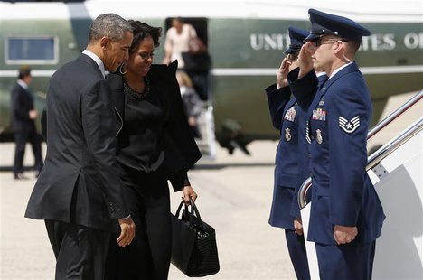 U.S. President Barack Obama and first lady Michelle Obama board Air Force One as they depart Joint Base Andrews in Washington for New York t U.S. President Barack Obama and first lady Michelle Obama board Air Force One as they depart Joint Base Andrews in Washington for New York t