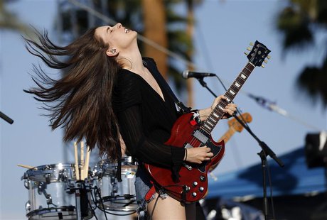 Danielle Haim of rock band Haim performs at the Coachella Music Festival in Indio, California April 11, 2014. A slew of rising artists and b Danielle Haim of rock band Haim performs at the Coachella Music Festival in Indio, California April 11, 2014. A slew of rising artists and b
