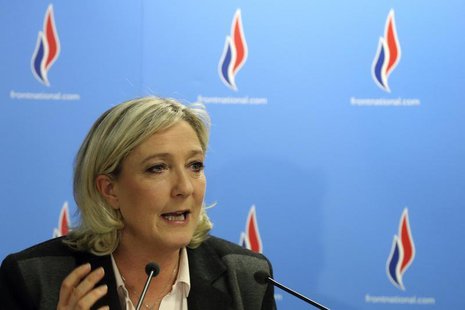 Marine Le Pen, France's far-right National Front political party leader, gestures as she delivers a speech after the second round in the Fre Marine Le Pen, France's far-right National Front political party leader, gestures as she delivers a speech after the second round in the Fre