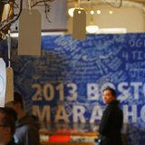 A peace sign is seen on a message tree as visitors look at artefacts in a public exhibition of objects and mementos left at the makeshift me A peace sign is seen on a message tree as visitors look at artefacts in a public exhibition of objects and mementos left at the makeshift me