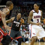 Apr 12, 2014; Atlanta, GA, USA; Miami Heat guard Mario Chalmers (15) defends Atlanta Hawks guard Louis Williams (3) during the fourth quarte Apr 12, 2014; Atlanta, GA, USA; Miami Heat guard Mario Chalmers (15) defends Atlanta Hawks guard Louis Williams (3) during the fourth quarte