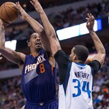 Apr 12, 2014; Dallas, TX, USA; Dallas Mavericks forward Brandan Wright (34) defends against Phoenix Suns forward Channing Frye (8) during th Apr 12, 2014; Dallas, TX, USA; Dallas Mavericks forward Brandan Wright (34) defends against Phoenix Suns forward Channing Frye (8) during th