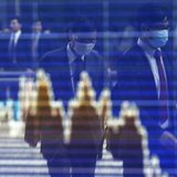 Men, wearing masks, are reflected on a screen displaying a graph showing movements of Shanghai B shares outside a brokerage in Tokyo April 9 Men, wearing masks, are reflected on a screen displaying a graph showing movements of Shanghai B shares outside a brokerage in Tokyo April 9