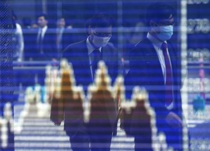 Men, wearing masks, are reflected on a screen displaying a graph showing movements of Shanghai B shares outside a brokerage in Tokyo April 9 Men, wearing masks, are reflected on a screen displaying a graph showing movements of Shanghai B shares outside a brokerage in Tokyo April 9