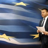 Greece's Finance Minister Yannis Stournaras arrives for a news briefing following his meeting with European Competition Commissioner Joaquin Greece's Finance Minister Yannis Stournaras arrives for a news briefing following his meeting with European Competition Commissioner Joaquin