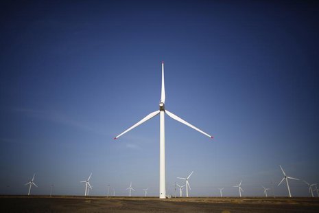 Wind turbines used to generate electricity are seen at a wind farm in Guazhou, 950km (590 miles) northwest of Lanzhou, Gansu Province Septem Wind turbines used to generate electricity are seen at a wind farm in Guazhou, 950km (590 miles) northwest of Lanzhou, Gansu Province Septem