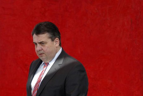 Leader of Germany's Social Democratic Party (SPD) Sigmar Gabriel arrives for a party board meeting in Berlin February 17, 2014. REUTERS/Tobi Leader of Germany's Social Democratic Party (SPD) Sigmar Gabriel arrives for a party board meeting in Berlin February 17, 2014. REUTERS/Tobi