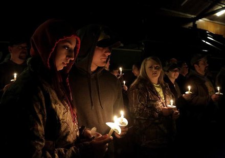 Members of communities affected by the Oso mudslide participate a candlelight vigil at the Community Center in Darrington, Washington April Members of communities affected by the Oso mudslide participate a candlelight vigil at the Community Center in Darrington, Washington April