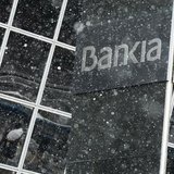Snow falls at Bankia headquarters in Madrid, February 3, 2014. REUTERS/Andrea Comas Snow falls at Bankia headquarters in Madrid, February 3, 2014. REUTERS/Andrea Comas