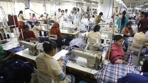 Employees work in a factory of Babylon Garments in Dhaka January 3, 2014. REUTERS/Andrew Biraj Employees work in a factory of Babylon Garments in Dhaka January 3, 2014. REUTERS/Andrew Biraj
