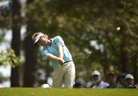 Former Master champion Bernhard Langer of Germany hits his tee shot on the fourth hole during the third round of the Masters golf tournament Former Master champion Bernhard Langer of Germany hits his tee shot on the fourth hole during the third round of the Masters golf tournament