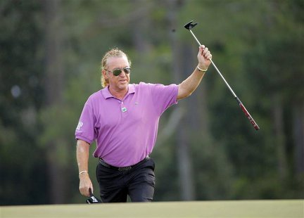 Spain's Miguel Angel Jimenez walks to the 18th green during the final round of the Masters golf tournament at the Augusta National Golf Club Spain's Miguel Angel Jimenez walks to the 18th green during the final round of the Masters golf tournament at the Augusta National Golf Club