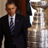 United States president Barack Obama enters the East Room behind the Stanley Cup prior to an event honoring the 2013 NHL Stanley Cup champio United States president Barack Obama enters the East Room behind the Stanley Cup prior to an event honoring the 2013 NHL Stanley Cup champio