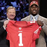 Defensive end Aldon Smith of the University of Missouri stands with NFL Commissioner Roger Goodell after being selected as the seventh overa Defensive end Aldon Smith of the University of Missouri stands with NFL Commissioner Roger Goodell after being selected as the seventh overa