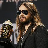 Actor Jared Leto poses backstage with the award for Best Onscreen Transformation for "Dallas Buyers Club" at the 2014 MTV Movie Awards in Lo Actor Jared Leto poses backstage with the award for Best Onscreen Transformation for "Dallas Buyers Club" at the 2014 MTV Movie Awards in Lo