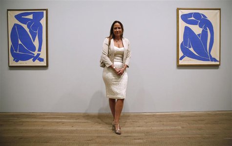 Sophie Matisse, great granddaughter of Henri Matisse, poses with his artwork "Blue Nude III" (Nu Bleu III) (L) and "Blue Nude II" (Nu Bleu I Sophie Matisse, great granddaughter of Henri Matisse, poses with his artwork "Blue Nude III" (Nu Bleu III) (L) and "Blue Nude II" (Nu Bleu I