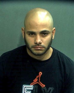 Robert Corchado, 28, is seen in a booking photo from the Orange County Jail in Orlando, Florida taken April 10, 2014. REUTERS/Orange County Robert Corchado, 28, is seen in a booking photo from the Orange County Jail in Orlando, Florida taken April 10, 2014. REUTERS/Orange County