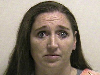 Megan Huntsman is shown in this booking photo provided by the Pleasant Grove County Jail in Pleasant Grove, Utah April 13, 2014. REUTERS/Ple Megan Huntsman is shown in this booking photo provided by the Pleasant Grove County Jail in Pleasant Grove, Utah April 13, 2014. REUTERS/Ple