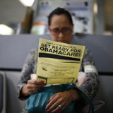 Arminda Murillo, 54, reads a leaflet at a health insurance enrollment event in Cudahy, California March 27, 2014. REUTERS/Lucy Nicholson Arminda Murillo, 54, reads a leaflet at a health insurance enrollment event in Cudahy, California March 27, 2014. REUTERS/Lucy Nicholson