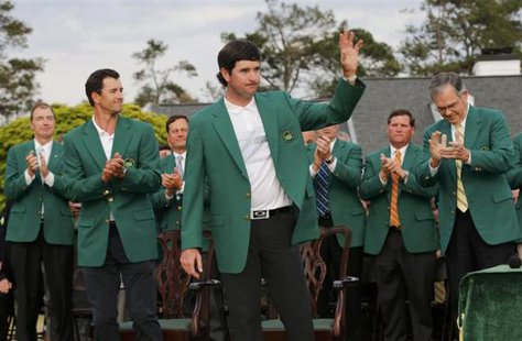 Masters champion Bubba Watson of the U.S. waves after being presented the traditional green jacket by last year's champion Adam Scott of Australia (L) after the final round of the Masters golf More...
CREDIT: REUTERS/MIKE BLAKE Masters champion Bubba Watson of the U.S. waves after being presented the traditional green jacket by last year's champion Adam Scott of Australia (L) after the final round of the Masters golf More...
CREDIT: REUTERS/MIKE BLAKE