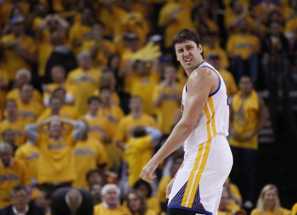 Golden State Warriors Andrew Bogut reacts during their loss to the San Antonio Spurs in their NBA Western Conference semi-final playoff bask Golden State Warriors Andrew Bogut reacts during their loss to the San Antonio Spurs in their NBA Western Conference semi-final playoff bask